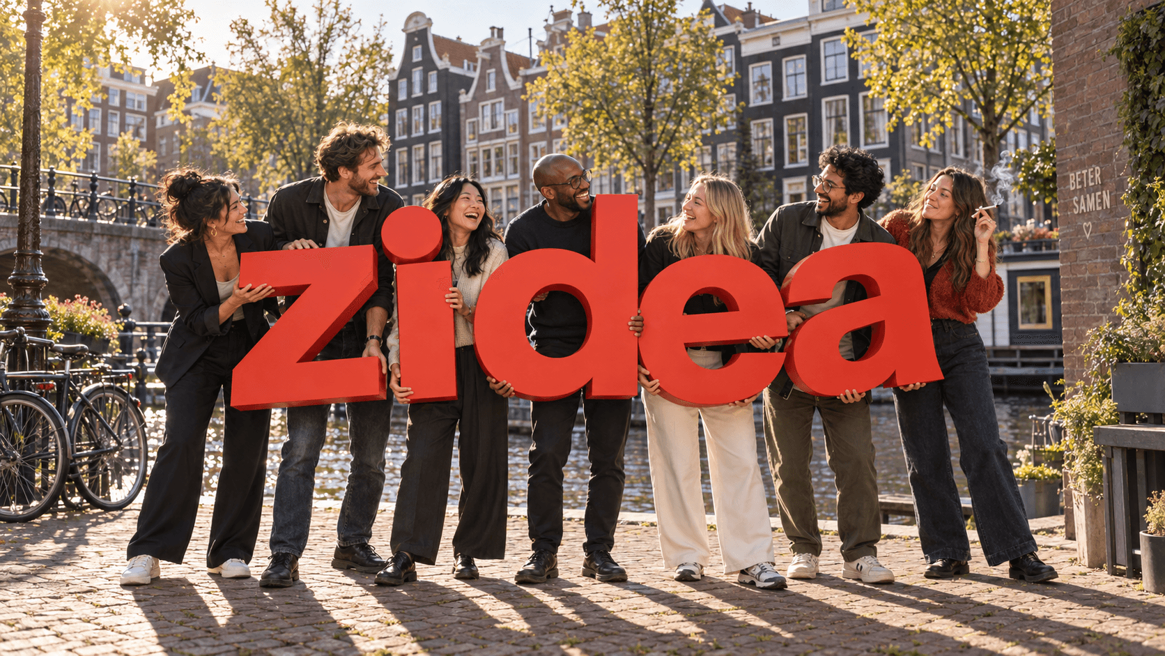 AI-generated fictional office photograph. Seven adult coworkers hold orange zidea letters by an Amsterdam canal; a woman at the right smokes a joint with visible smoke.